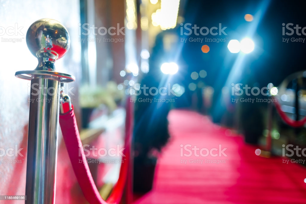 Red carpet at an exclusive event. Award ceremony red carpet Festive event or celebrity entrance concept. stock photo