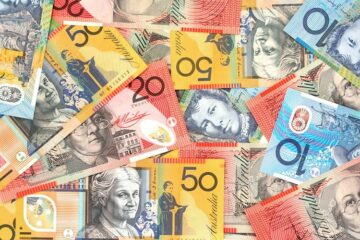 AUD/USD eases from five-month high, holds steady below 0.7000 amid sustained USD selling