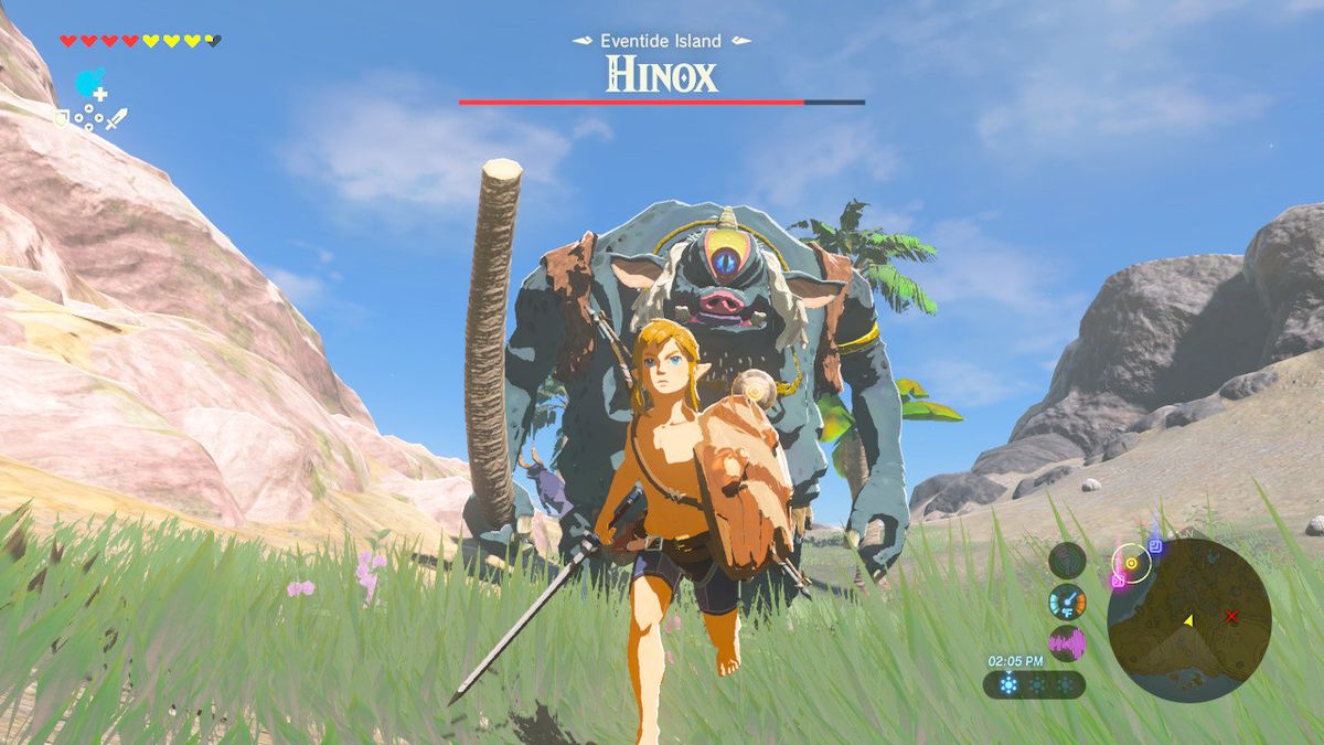 Link running from a Hinox in The Legend of Zelda: Breath of the Wild, holding a sword and a wooden shield as the large, piglike enemy hulks in the background.