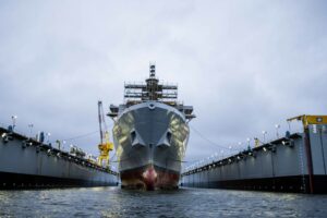 Naval chief says rising cost spurred amphib production pause