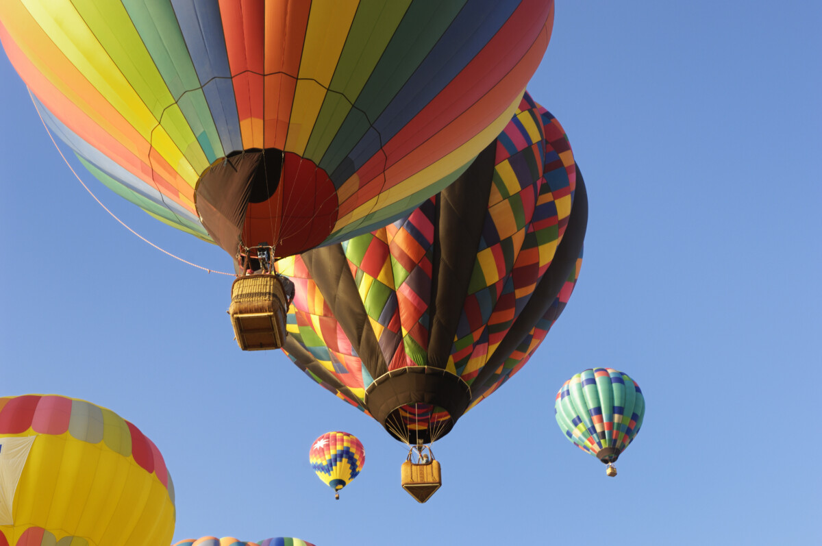 Colorful Hot Air Balloons Ascending Into Sky