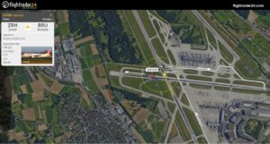 SWISS Airbus A320 undviker snävt att korsa fordon när de lyfter till Bryssel, Belgien