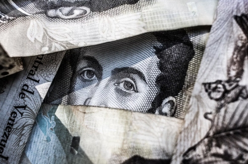 Unsplash Freddie Collins banknote face - US Treasury Demands DeFi Adhere to Anti-Money Laundering Rules