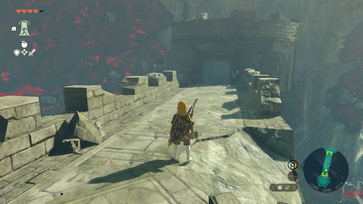 Link strolls down a rampart in Hyrule Castle in Zelda Tears of the Kingdom.
