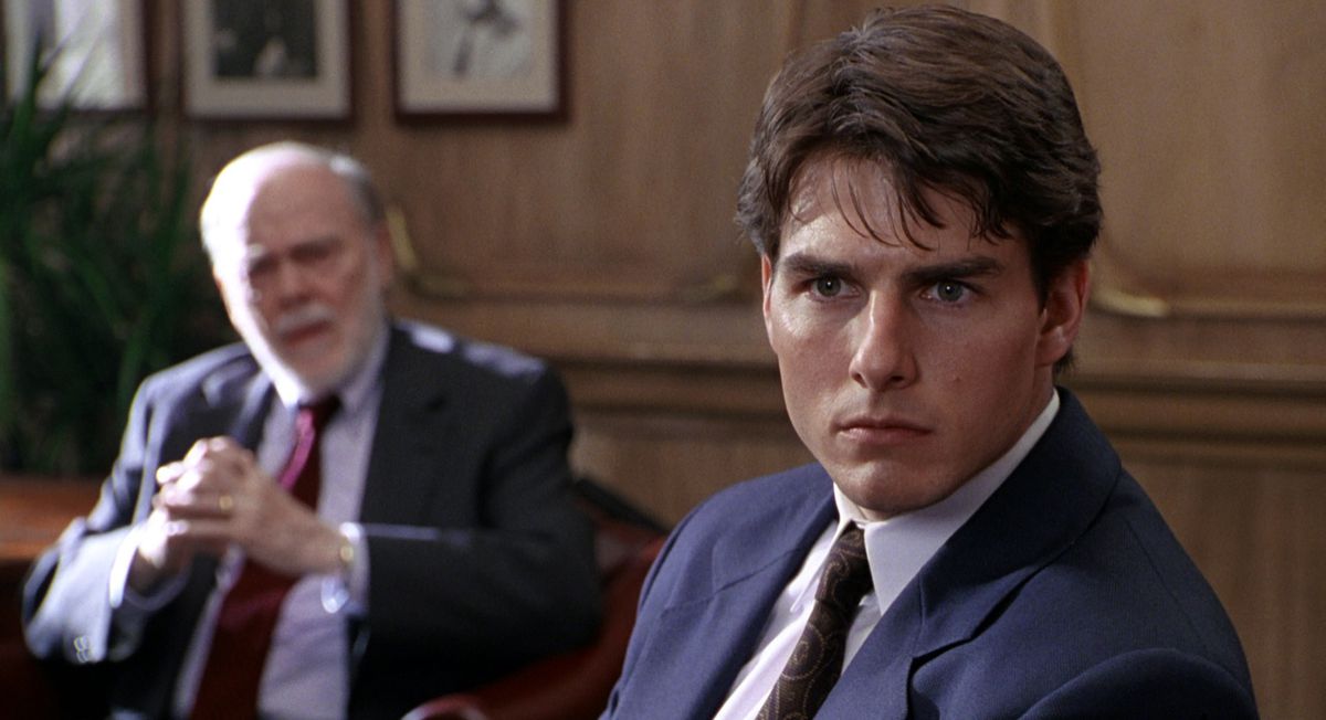 Tom Cruise sebagai Mitch McDeere di The Firm.