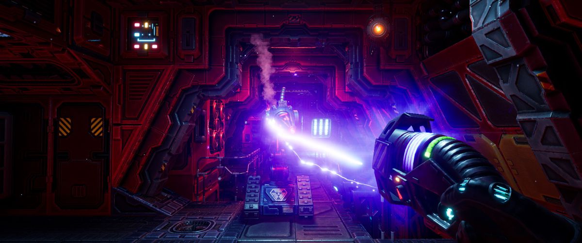 The player fires a purple laser beam at an approaching robot on treads in the System Shock remake