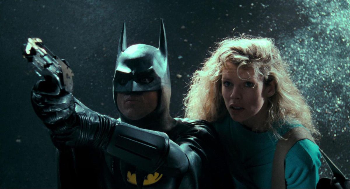 Michael Keaton and Kim Basinger as Batman and Vicki Vale in Batman.
