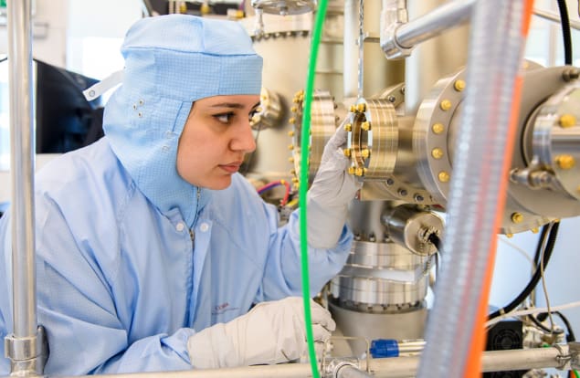 Elham Fadaly in the lab in a clean suit