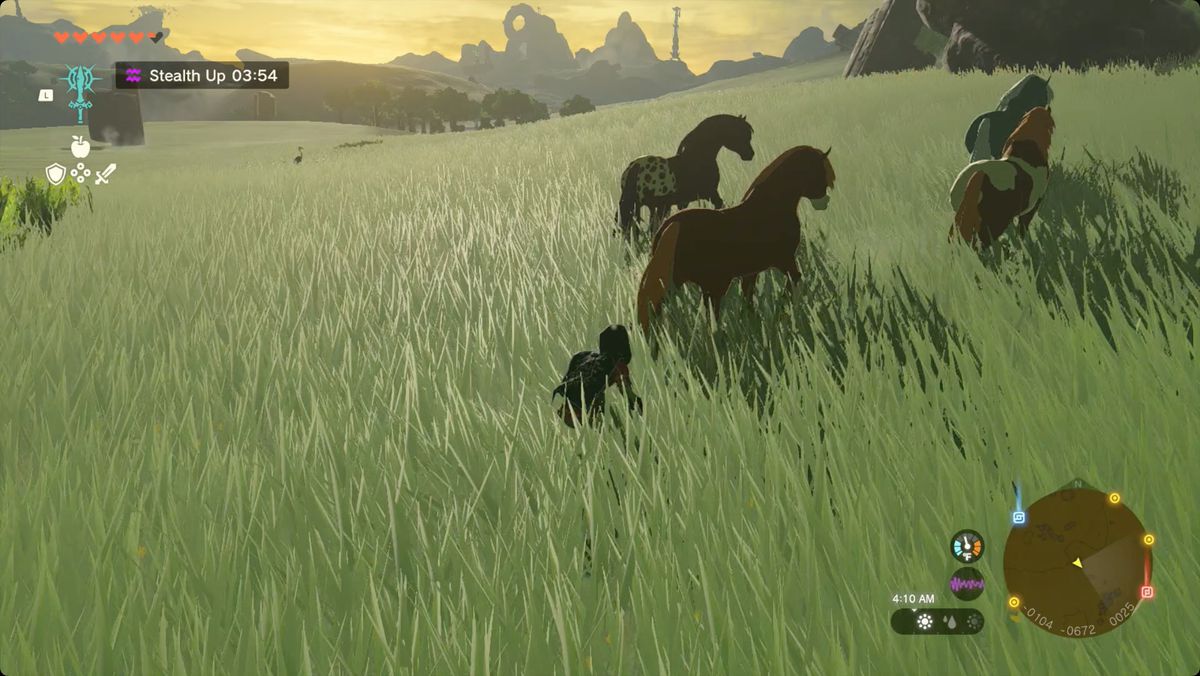 The Legend of Zelda: Tears of the Kingdom Link stealthily approaching a herd of wild horses