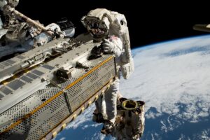 Space station astronauts continue power system upgrades with new solar array