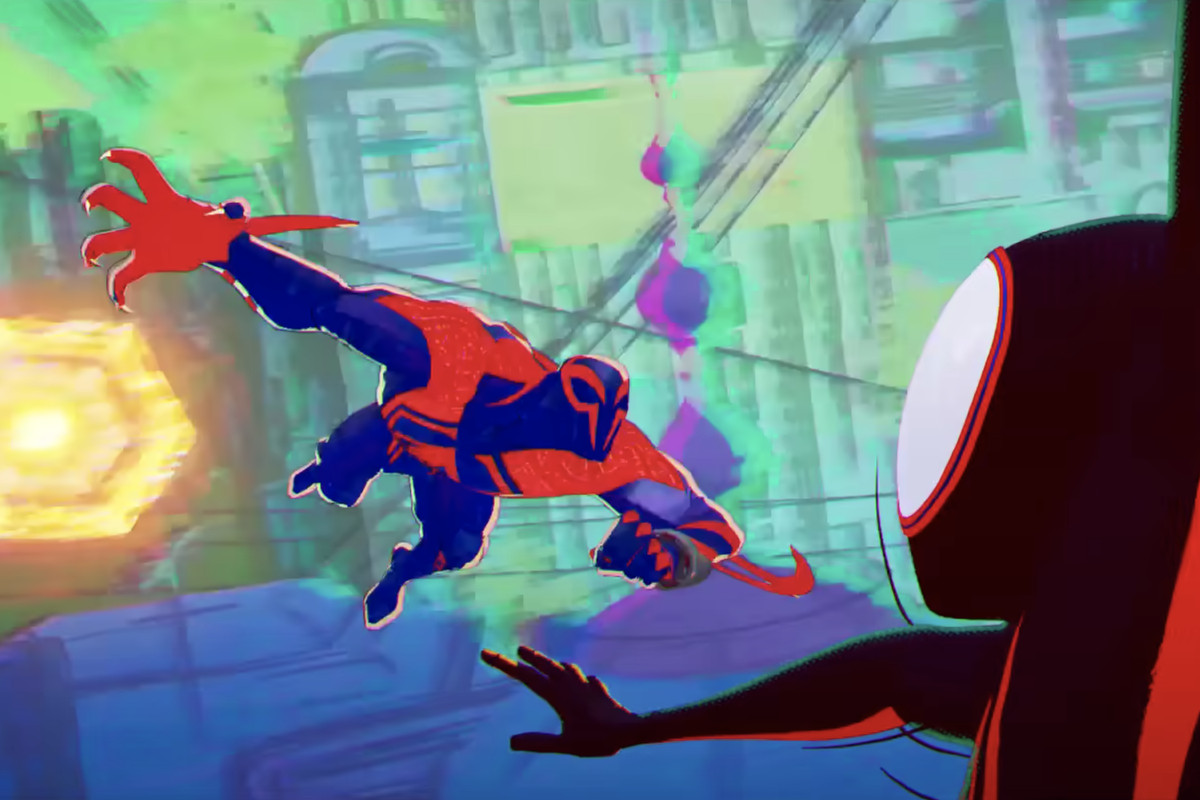 Miguel O’Hara/Spider-Man 2099 springs out of a portal and leaps at Miles Morales/Spider-Man in a trailer for Across the Spider-Verse.