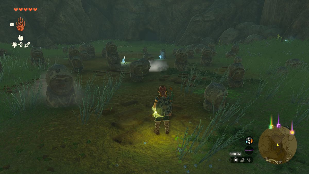 Link is surrounded by stone statues on his way to the Robred Dropoff Cave in Zelda: Tears of the Kingdom