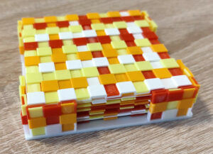Sottobicchieri tessuti stampati in 3D salvano i ripiani del tavolo con stile