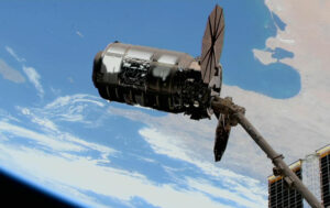Cygnus cargo ship berthed at space station