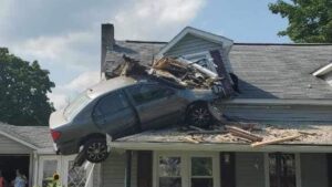 Driver launches Corolla into second floor of a house, and cops say it was on purpose - Autoblog