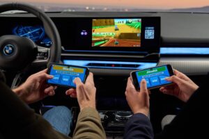 Gaming in de auto: hoofdrolspelers, ontwikkelingen en vooruitzichten