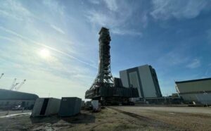 NASA’s moon program mobile launcher rolls back to the launch pad for testing