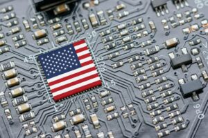 US research interests closely tied to microelectronics industrial base