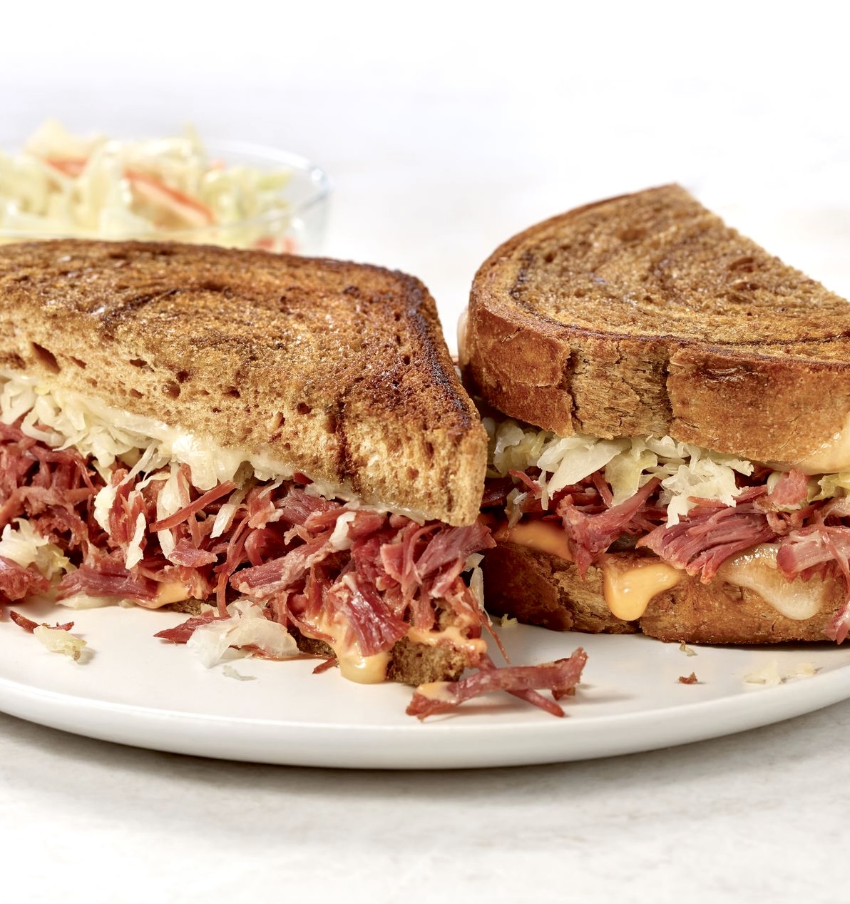 sandwich with cheese and shredded meat - Bakers Square's signature dishes