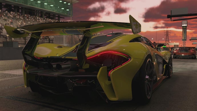 Forza Motorsport screenshot showing the rear corner of a lemon yellow racecar