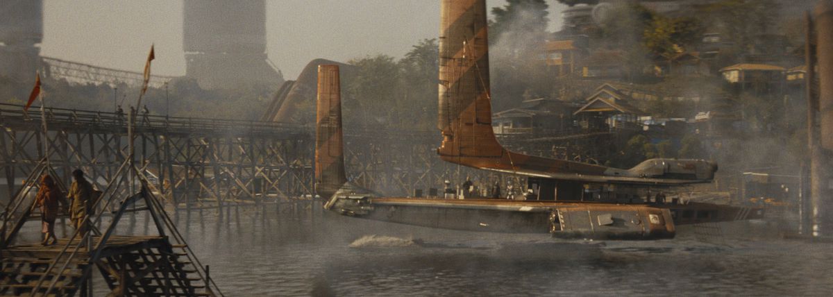 several floating hoverboats cross a river in The Creator