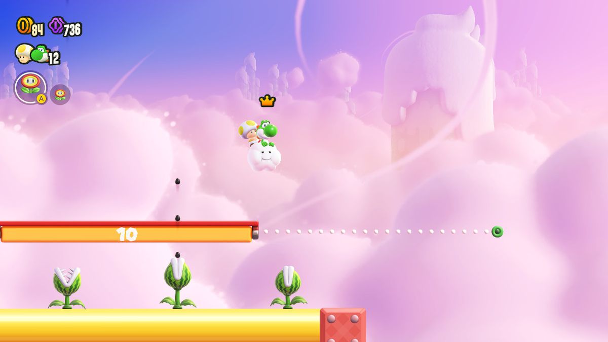 Padde på Yoshis rygg i en Lakitu Cloud, i et Super Mario Bros. Wonder-nivå.