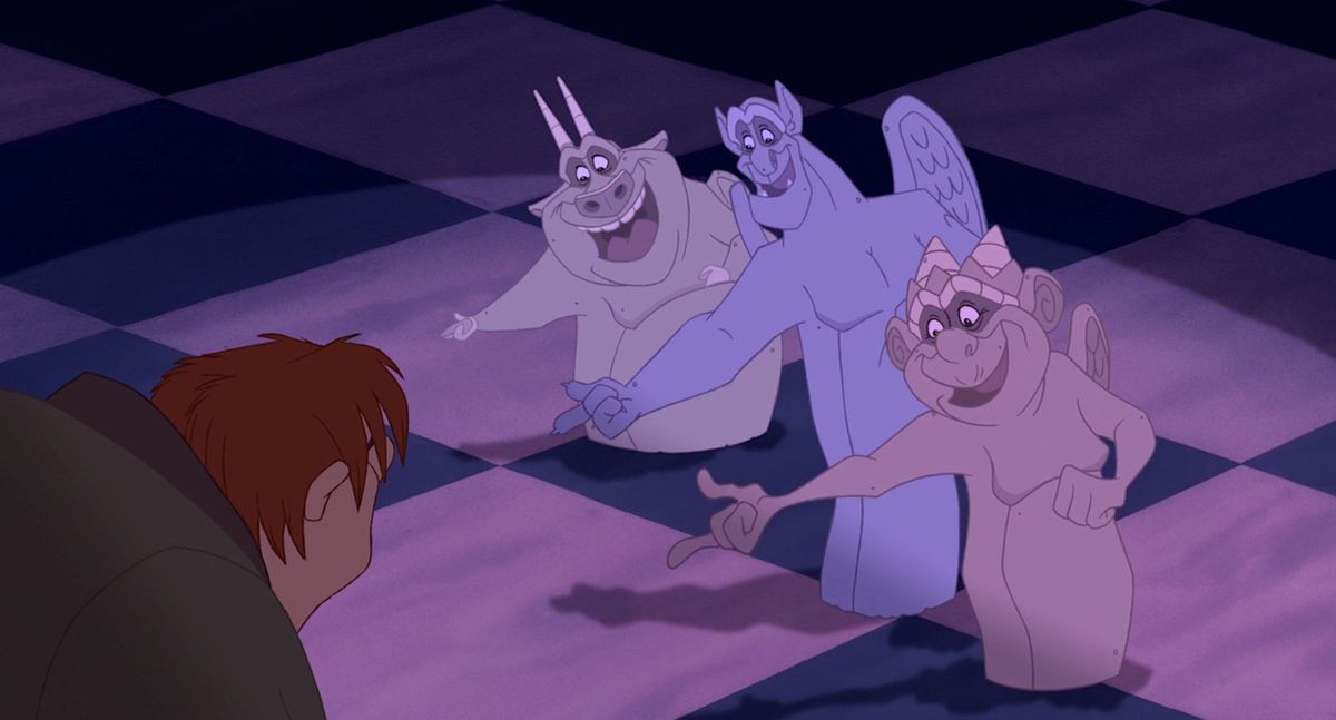 Laverne, Victor, and Hugo, the gargoyles from Disney’s 1996 animated movie The Hunchback of Notre Dame, stand in a row with their arms out to their human friend Quasimodo during a musical number