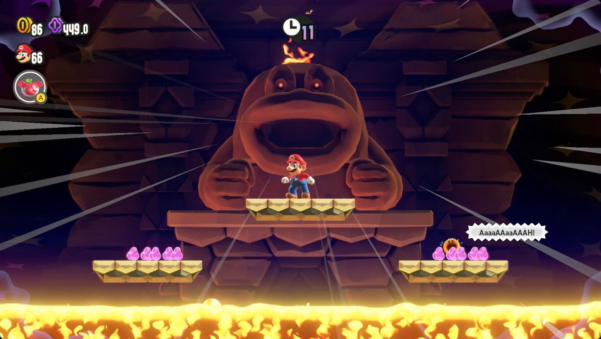 Super Mario Bros. Wonder Wavy Ride through the Magma Tube screenshot showing the location of a Wonder Seed.