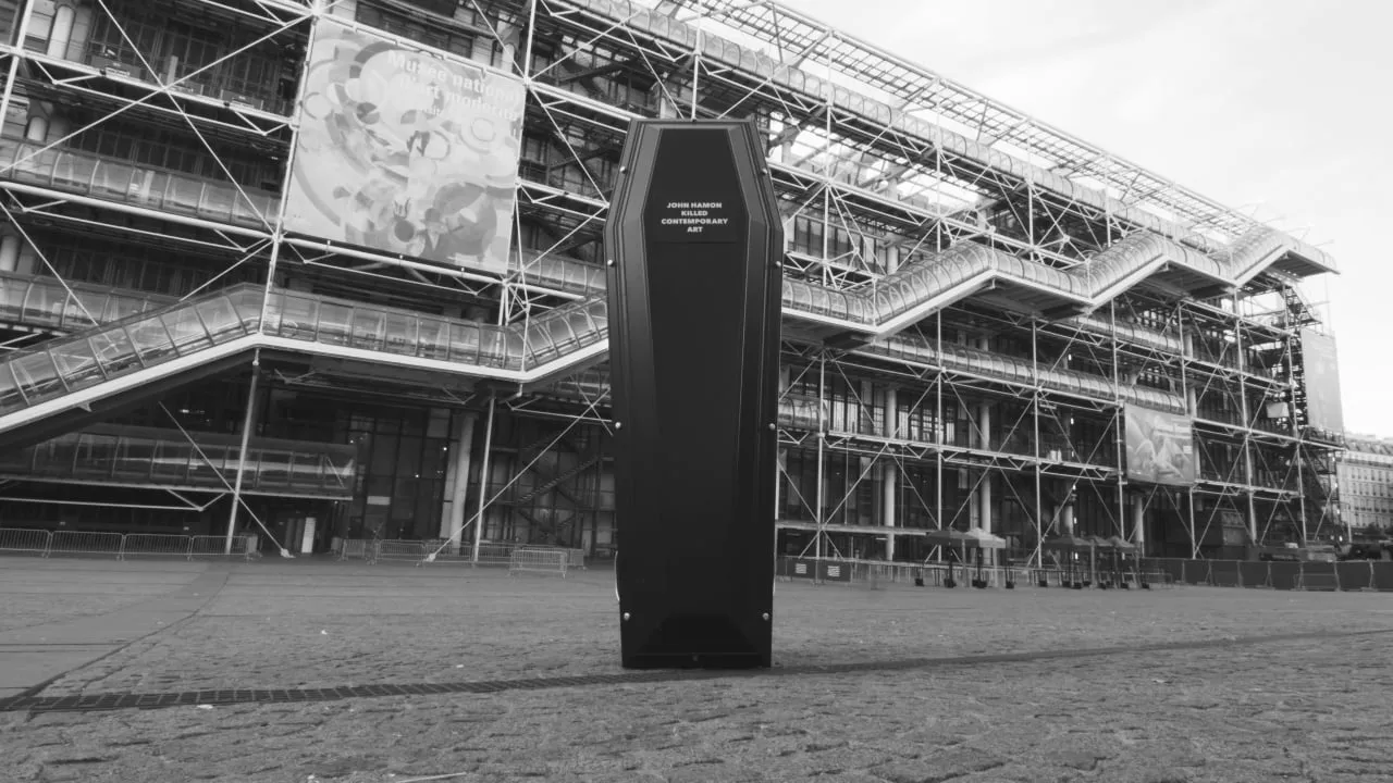 A coffin in front of the pompidou.