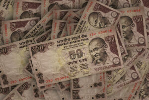 USD/INR posts modest losses as Fed maintains status quo