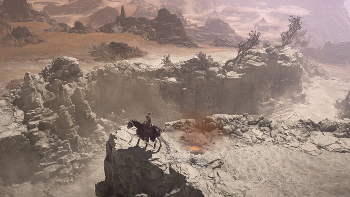Wojownik na koniu eksploruje krajobrazy Diablo 4.