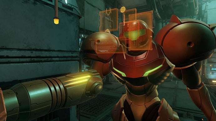 Самус смотрит на голографический интерфейс на этом снимке экрана из Metroid Prime: Remastered.