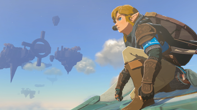 Linkki kyykistyy taivaalla purjelentokoneen päällä The Legend of Zelda: Tears of the Kingdom -pelissä