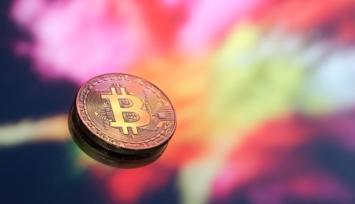 Freepik pvproductions Bitcoin on colourful background - SEC Progresses Talks With US Bitcoin ETF Issuers