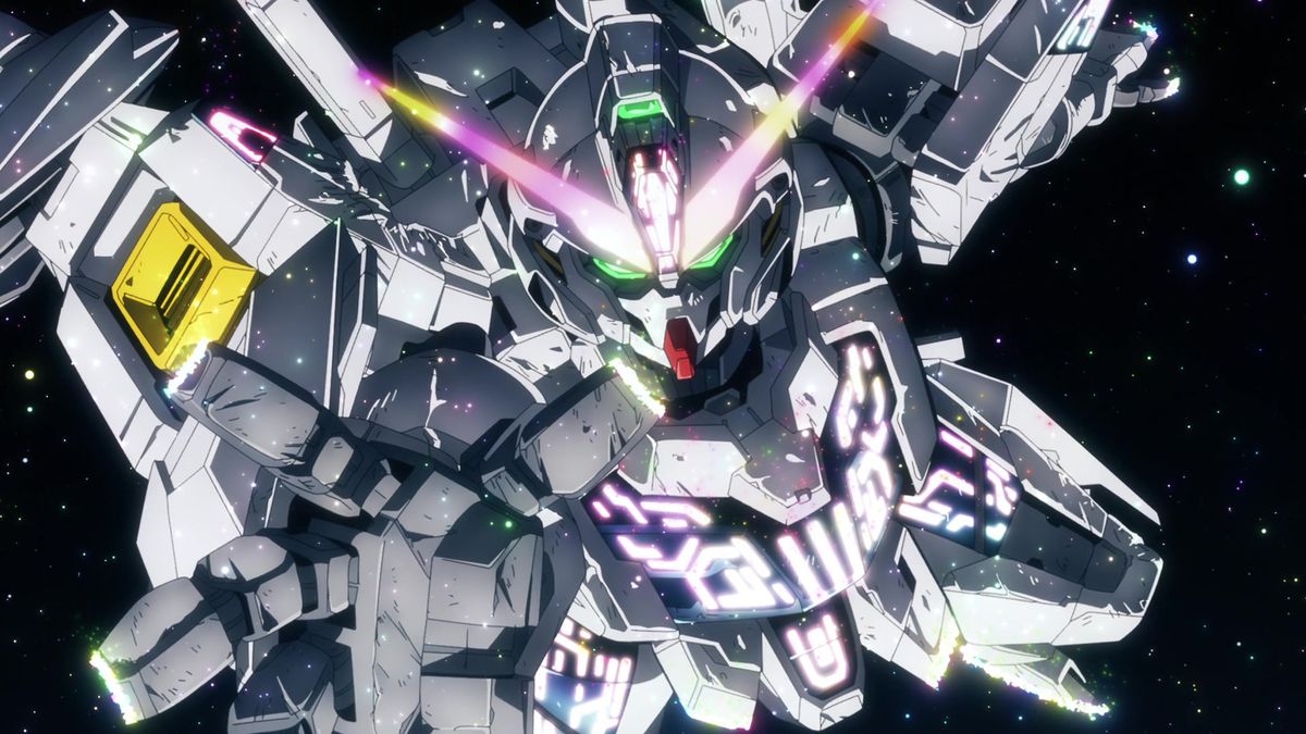 The XVX-016 Gundam Aerial reaching its right hand forward and glowing with purple and pink highlights in Mobile Suit Gundam: The Witch From Mercury.