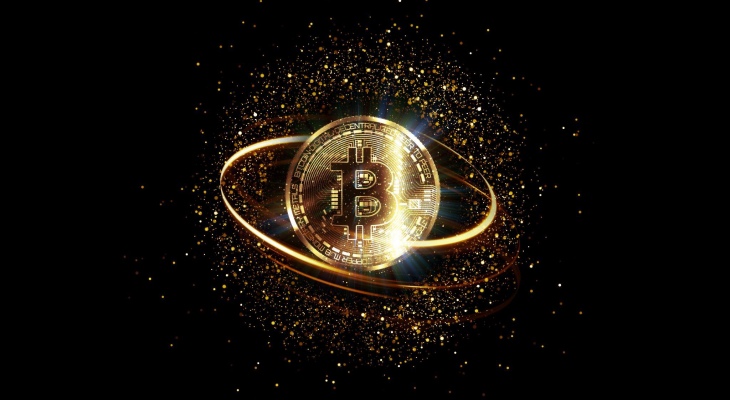 χρυσό νόμισμα με σύμβολο bitcoin