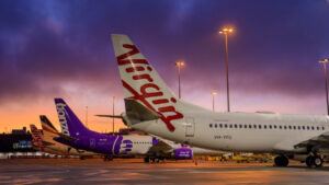 Flere luftfartsselskaber på en rute kan halvere billetpriserne, siger minister