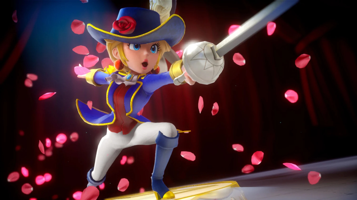 Скриншот из Princess Peach Showtime, на котором изображена принцесса Пич, указывающая мечом.