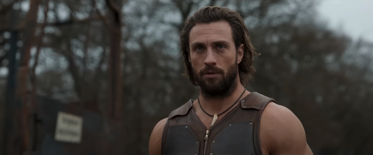 A close up of Aaron Taylor-Johnson as Kraven in the film Kraven the Hunter