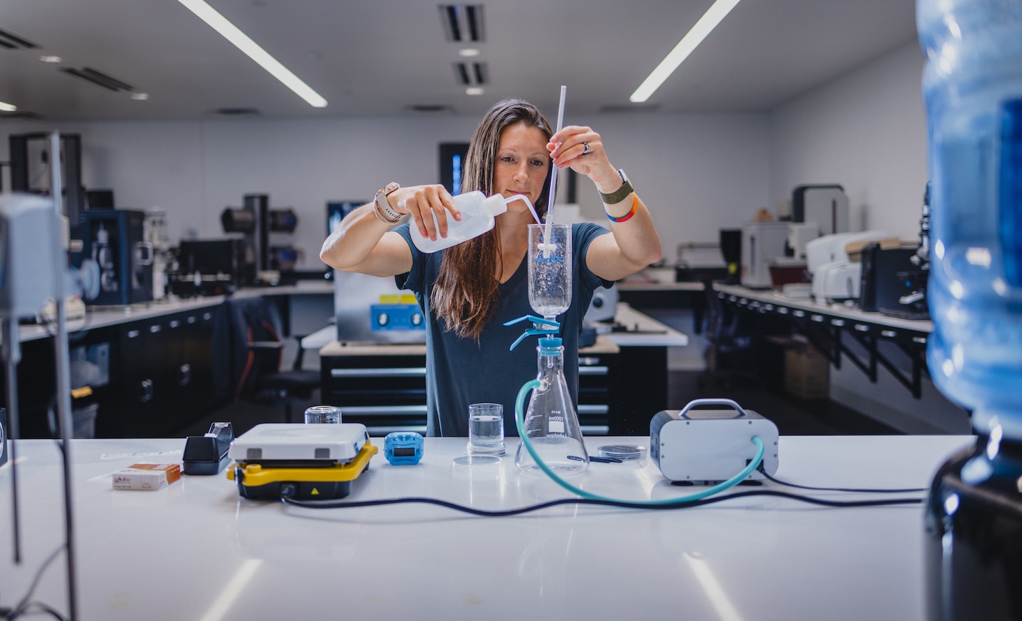 Candace Davidow, Under Armour manager and materials lab engineer, tests fiber shedding at the UA Lighthouse in Baltimore, Maryland. 