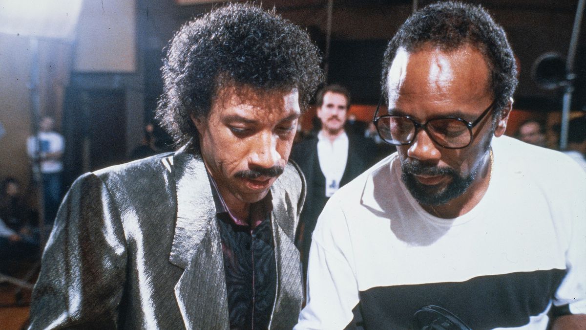 Lionel Richie and Quincy Jones looking at sheet for music for “We Are the World” in The Greatest Night in Pop documentary